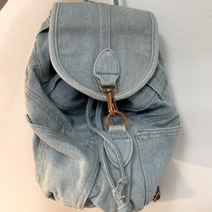 Denim Urban Outfitters small backpack with multiple pockets